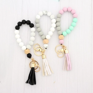Silicone bead keychain bracelet with wooden bead and leather tassel in various colors