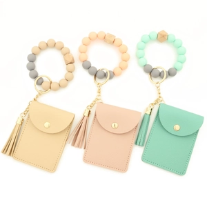 Silicone bead wristlet keychain with leather card holder and tassel in pastel colors