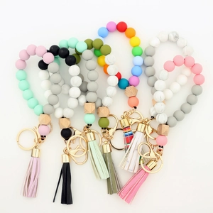 Silicone Food Grade Bead Bracelet Beech Wood Bead Wristband Keychain With Leather Tassel Metal Key Ring For Women