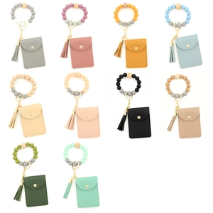 Bracelet porte-clés en perles de silicone avec porte-carte et pompon en 10 coloris