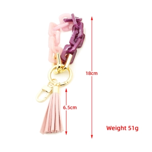 Porte-clés en acrylique rose et violet avec fermoir doré et gland en cuir, long de 18 cm