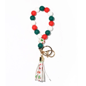 Christmas silicone bead bracelet with wooden beads, Santa charm and festive leather tassel