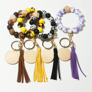 Silicone and beech wood bead wristlet keychain set with tassels in four patterns