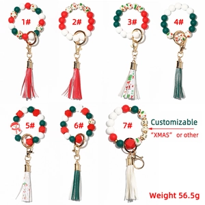 Christmas silicone bead keychain wristlet with festive patterns and faux leather tassel