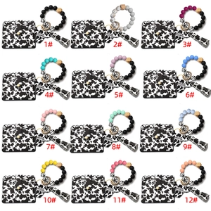 Set Portachiavi Bracciale in Grani di Silicone con Stampa Mucca con Portacarte in Pelle PU Frange Ciondolo Testa di Mucca Mama