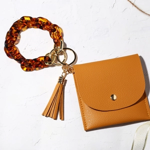 Amber tortoiseshell resin bangle with ginger yellow PU leather keychain wallet and tassel