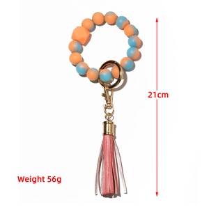 Glow silicone bead keychain bracelet with orange tassels and gold lobster clasp 21cm
