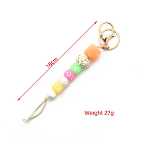 Luminous silicone bead keychain bracelet with XOXO pattern and metal lobster clasp