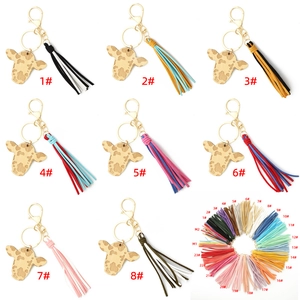 Faux leather cow head keychain with colorful long tassels and golden metal rings