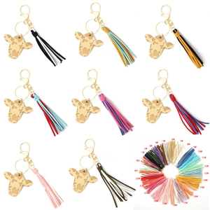 Selection of leopard bull head keychains with colorful tassels and gold lobster clasps