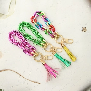 Colorful acrylic chain keychain bracelets with glossy tassels and golden lobster clasps