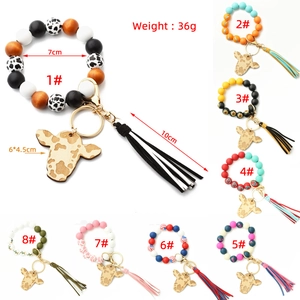 Western style cow head beaded wristlet keychain with leather tassel in various patterns