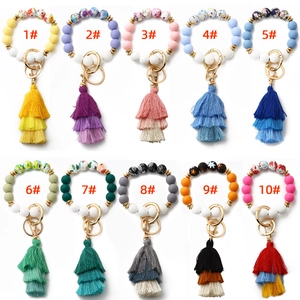 Bohemian silicone bead bracelets with tassels and keychains in ten diverse color styles