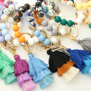 Bohemian silicone bead keychain bracelets with multi-color tassels and gold spring clasps