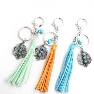 Bohemian tassel keychain set with metal leaf pendants and wooden beads in three colors