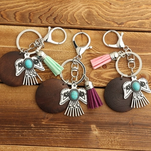 Bohemian eagle keychain with wooden pendant and colorful tassels in western retro style