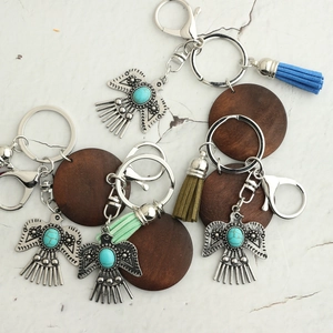 Bohemian silver eagle keychain set with wooden disc, turquoise gem, and colorful tassels