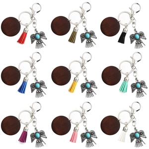 Bohemian eagle keychains with colorful leather tassels and round wooden tags in nine colors