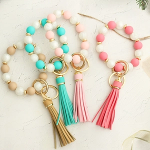 Silicone beaded wristlet keychain with PU leather tassel in multiple colors and wood beads