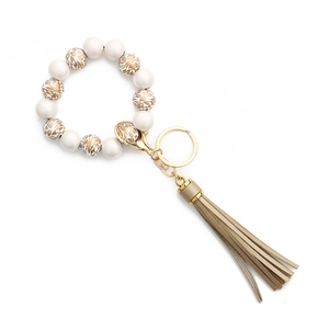 Bracelet porte-clés en perles de silicone léopard avec anneau doré et pendentif à pompon