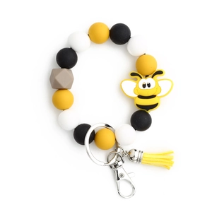 Bracelet porte-clés en perles de silicone avec breloque abeille jaune et gland coloré