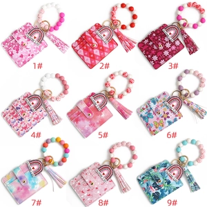 Nine colorful patterns of PU card holder wristlet sets with heart charms for Valentine's Day