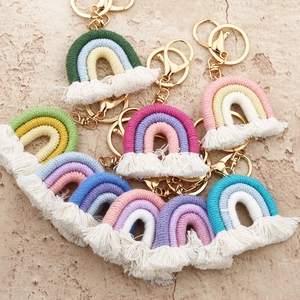 Handmade woven cotton rainbow keychain with colorful tassels and golden lobster clasp