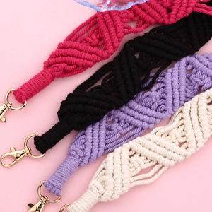 Handmade macrame woven bag straps in pink black purple and cream with gold metal hooks