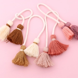 Handmade cotton fringe tassels in multiple colors for DIY bag accessories and decor