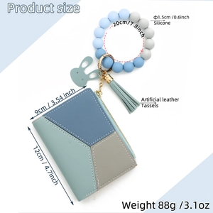 Detail view of silicone bead bracelet with tricolor zipper card wallet and tassels
