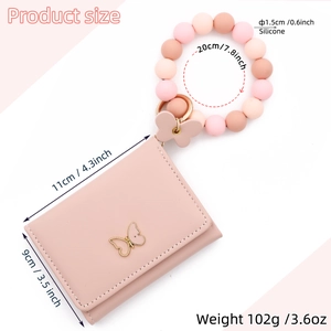 Pink faux leather butterfly card holder with silicone bead bracelet keychain and wristlet