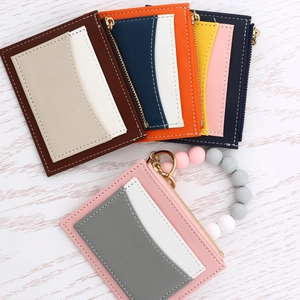 Detail of color-block PU leather card holder wallets with beaded silicone keychains