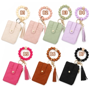 Detail of woven PU leather card holders with silicone bead wristlets in seven colors