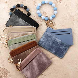 Portefeuille porte-clés élégant en similicuir avec bracelet en perles de silicone en couleurs variés