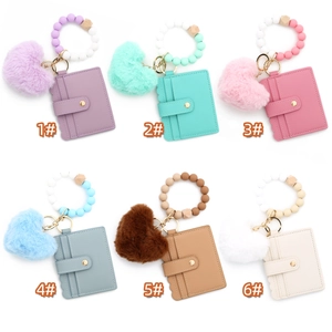 Détails de six coloris pour le porte-clés en perles de silicone avec porte-carte en cuir synthétique