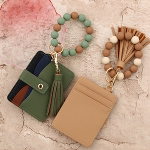 Silicone beaded wristlet keychain with multi-color leather card holder and tassel charm