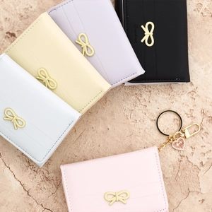 Three-fold short bowknot wallet for women in multiple colors with heart pendant
