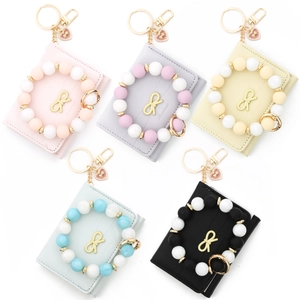 Portefeuille Femme en Similicuir Plié en Trois Avec Nœud Bracelet en Perles de Silicone Pendentif Cœur Porte-Clés Porte-Cartes