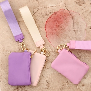 Three-piece multifunctional waterproof nylon mini coin purses in pastel colors with lanyards