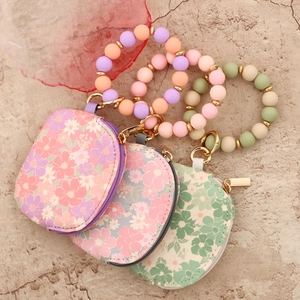 Waterproof floral wristlet wallets with silicone beads and gold keychains in three colors