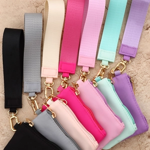 Waterproof nylon mini wallets in seven colors with wrist straps and golden hooks