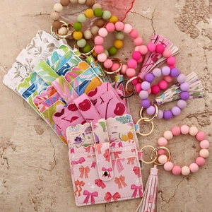 Silicone bead keychain bracelet set with floral bow card holder and leather tassel