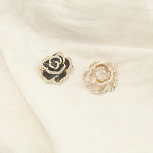 Elegant black enamel and pearl camellia brooches with gold plating and rhinestones