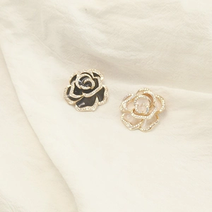 Elegant rose flower stud earrings with gold plating and sparkling crystal accents