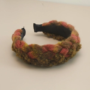 Detailed view of the Bohemian braided fabric headband with vintage mixed color wool texture