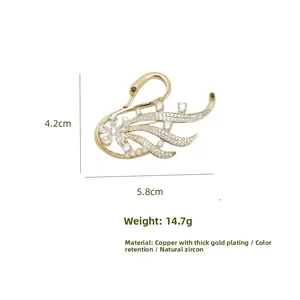 Detail specifications of swan brooch with gold plating and zircon, size 5.8cm x 4.2cm