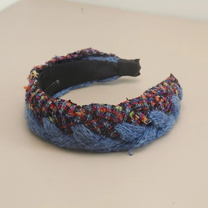 Detail view of the bohemian style thick woven tweed headband with anti-slip inner lining