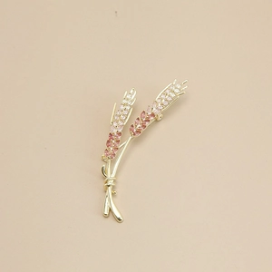 Classic gold wheat ear brooch featuring pink and white micro-set cubic zirconia stones