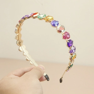 Colorful rhinestone metal headband with multi-colored heart gems for a trendy fairy look
