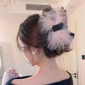Elegant large pink ostrich feather bow hair claw clip for women's hair styling